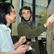 Student discussing poster